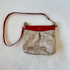 Coach Ashley Dotted Op Art F20088
Red and Tan Signature Crossbody Bag